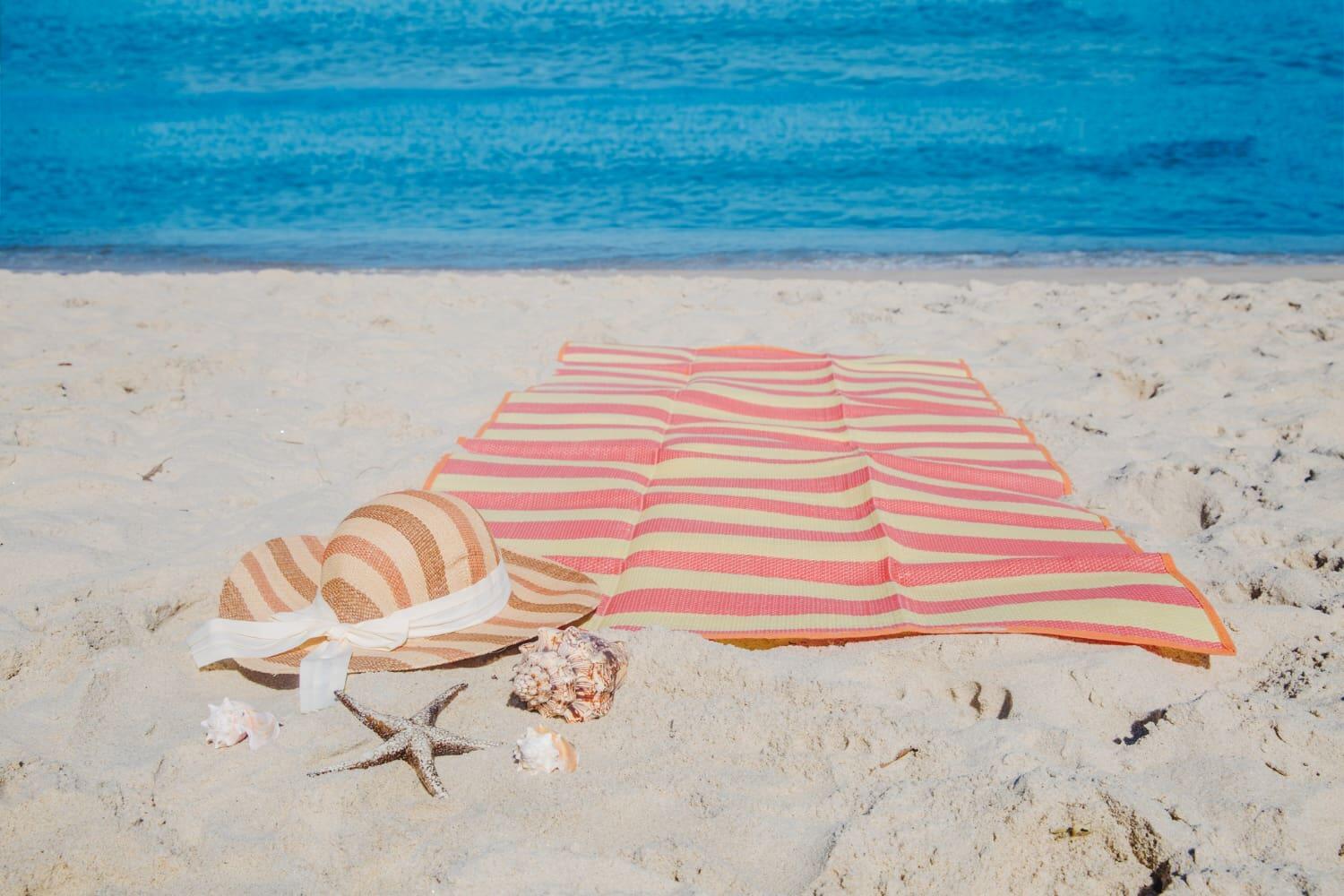 Plaža, peškir, more, vlasnica apartmana